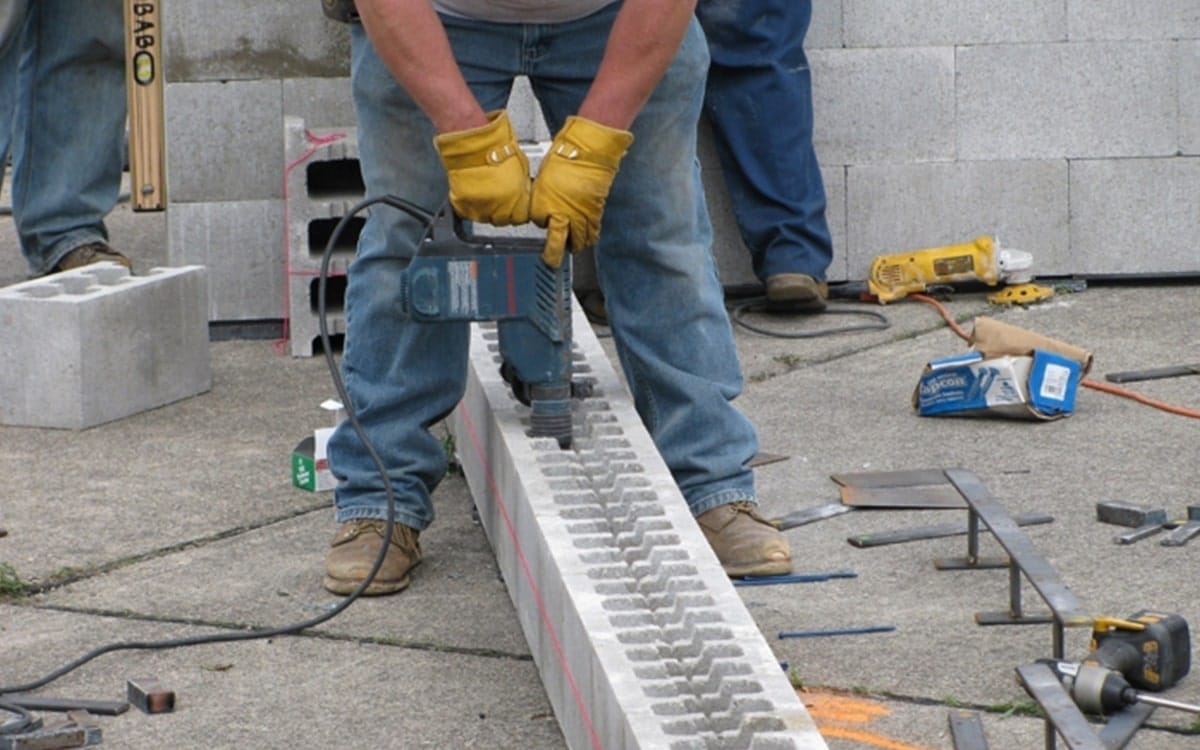 construction worker installing bolt-a-blok system